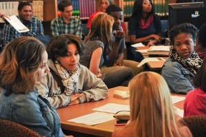 High school students meet and conduct class in their classroom. Students can learn much more outside the classroom. (Photo via Flickr/RDECOM)